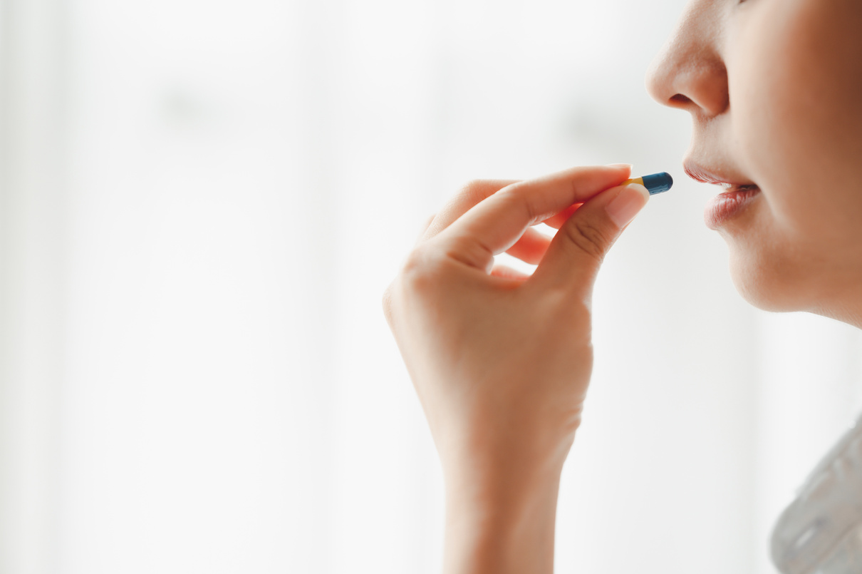 Person Taking a Medicine  